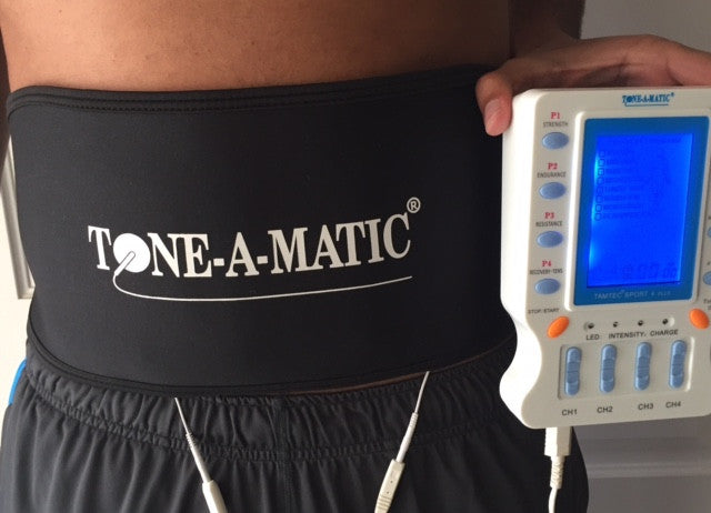 Man wearing Tone-A-Matic Abdominal Belt that is connected to the TAMTEC SPORT 4 PLUS machine